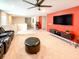 Upstairs bonus room featuring home theater seating, TV and a game table at 1876 Summer Dr, Davenport, FL 33897