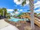 Scenic lazy river winding through lush landscaping, offering a relaxing float for residents at 1876 Summer Dr, Davenport, FL 33897