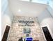 Beautiful lobby with stone accents and Windsor Island Resort sign at 1876 Summer Dr, Davenport, FL 33897