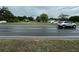Street view showing a highway and a silver SUV at 1886 Pleasant Hill Rd, Kissimmee, FL 34746