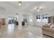 Open living area with tile floors, ample natural light, and a seamless flow to the outdoor lanai at 1951 Partin Terrace Rd, Kissimmee, FL 34744