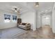 Bright living room with couch, natural light, and tile floors at 1951 Partin Terrace Rd, Kissimmee, FL 34744
