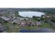 Panoramic aerial view of community with lake views, lush landscaping, and attractive homes nestled in a serene setting at 2016 Lakeside Ave, Davenport, FL 33837