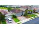 Lovely single-Gathering home featuring a brick driveway, clay tile roof, and green space at 2016 Lakeside Ave, Davenport, FL 33837