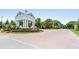 View of the community entrance sign and landscaping at 2016 Lakeside Ave, Davenport, FL 33837