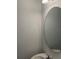 Cozy bathroom featuring a unique mirror and pristine white sink at 254 Mandovi St, Davenport, FL 33837