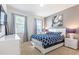 Comfortable bedroom with natural light and calming decor, perfect for relaxation at 2623 Calistoga Ave, Kissimmee, FL 34741
