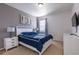 Comfortable bedroom featuring a queen-sized bed, and neutral decor at 2623 Calistoga Ave, Kissimmee, FL 34741