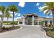 Gorgeous community clubhouse welcomes residents with beautiful landscaping and elegant architecture at 2623 Calistoga Ave, Kissimmee, FL 34741