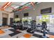 Well-equipped fitness center with treadmills and weights for a healthy lifestyle at 2623 Calistoga Ave, Kissimmee, FL 34741