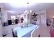 Open concept view of the dining area, kitchen, and living spaces at 2919 Woodward Ln, Winter Haven, FL 33884