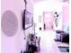 Open hallway layout with decorative accents leading to living areas and bedrooms at 2919 Woodward Ln, Winter Haven, FL 33884