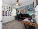 Bright bedroom with stylish decor, gray carpet, ceiling fan and unique wall art at 3052 Prelude Ln, Kissimmee, FL 34746