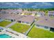 Aerial view of the home with solar panels and a swimming pool at 3062 Royal Tern Dr, Winter Haven, FL 33881