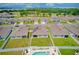 Aerial view of a neighborhood home featuring a pool and solar panels at 3062 Royal Tern Dr, Winter Haven, FL 33881