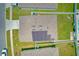 A close aerial view of a house showing solar panels on the roof at 3062 Royal Tern Dr, Winter Haven, FL 33881