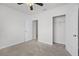 Bedroom with soft carpet, a closet, and doorways leading to other spaces at 3062 Royal Tern Dr, Winter Haven, FL 33881