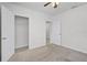 Bedroom featuring carpet, closet, and doorways to other areas of the home at 3062 Royal Tern Dr, Winter Haven, FL 33881