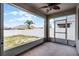 Screened-in patio with ceiling fan and view of the yard and fence at 3062 Royal Tern Dr, Winter Haven, FL 33881