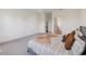 Bright bedroom features a cozy bed with decorative pillows, and a large window with natural light at 3224 Oxbow Ct, Harmony, FL 34773