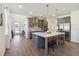 Spacious kitchen with modern appliances, a large island, and ample counter space at 3224 Oxbow Ct, Harmony, FL 34773