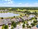 Beautiful aerial view of homes, pond and golf course in the desirable Harmony community at 3420 Middlebrook Pl, Harmony, FL 34773