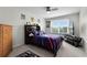 Comfortable bedroom with ceiling fan, and cozy furnishings at 3420 Middlebrook Pl, Harmony, FL 34773