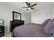 Bedroom featuring a bed, a dresser and neutral décor at 3420 Middlebrook Pl, Harmony, FL 34773