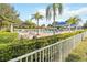 This resort style pool features covered areas and lounge chairs at 3420 Middlebrook Pl, Harmony, FL 34773