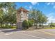 Exterior shot of the Harmony community entrance with attractive landscaping at 3420 Middlebrook Pl, Harmony, FL 34773