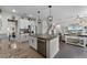 Bright kitchen with stainless steel appliances, granite countertops, and a center island at 3420 Middlebrook Pl, Harmony, FL 34773