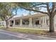 Exterior shot of a restaurant featuring a covered patio with colorful decor at 3420 Middlebrook Pl, Harmony, FL 34773