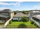 Aerial view of the home showcasing its landscaping and proximity to the neighboring homes at 3424 Middlebrook Pl, Harmony, FL 34773