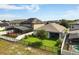 Beautiful backyard featuring a pool with a screened enclosure and well-maintained landscaping at 3424 Middlebrook Pl, Harmony, FL 34773