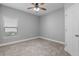 This is an airy bedroom with a ceiling fan and wood-style flooring at 3424 Middlebrook Pl, Harmony, FL 34773