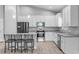 Spacious kitchen with stainless steel appliances, granite counters, and a center island with seating at 3424 Middlebrook Pl, Harmony, FL 34773