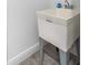 This is a laundry room with a utility sink and tile floor at 3424 Middlebrook Pl, Harmony, FL 34773