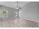 Large main bedroom with windows and an en-suite bathroom at 3424 Middlebrook Pl, Harmony, FL 34773
