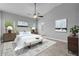 This is a lovely main bedroom with beautiful decor and wood-style flooring at 3424 Middlebrook Pl, Harmony, FL 34773