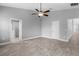 Spacious main bedroom offering dual walk-in closets and access to a private bath at 3424 Middlebrook Pl, Harmony, FL 34773
