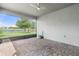 Screened patio with beautiful brick pavers overlooking the fenced backyard and pond at 3424 Middlebrook Pl, Harmony, FL 34773