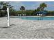 Community pool featuring a spacious deck and lounge chairs at 3476 Yarian Dr, Haines City, FL 33844