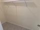 Walk-in closet featuring wire shelving and wood-look flooring at 3476 Yarian Dr, Haines City, FL 33844