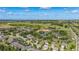 Scenic community featuring a lake, recreation area, and proximity to essential amenities at 3606 Solana Cir, Clermont, FL 34711