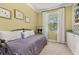 Bedroom showcases neutral carpet, a daybed, bright window, and built-in shelves at 3606 Solana Cir, Clermont, FL 34711