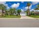 Beautiful single-Gathering home featuring a manicured lawn and two-car garage at 3606 Solana Cir, Clermont, FL 34711