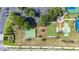 Aerial view of the recreation area with bocce ball, basketball, and other outdoor community amenities at 3606 Solana Cir, Clermont, FL 34711