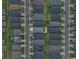 Aerial view showcases the neighborhood layout with well-maintained lawns and neatly arranged homes at 3926 Palazzo Pl, Winter Haven, FL 33884