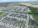 A birds-eye view of a planned community, showcasing the home's location in relation to surrounding amenities at 3926 Palazzo Pl, Winter Haven, FL 33884
