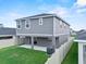 Picture of backyard with a lawn, white fence, patio and house in the background at 3926 Palazzo Pl, Winter Haven, FL 33884